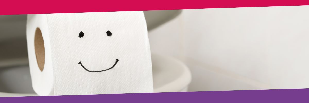 Graphic showing a toilet roll with a smiley face drawn on sitting on top of the toilet seat.